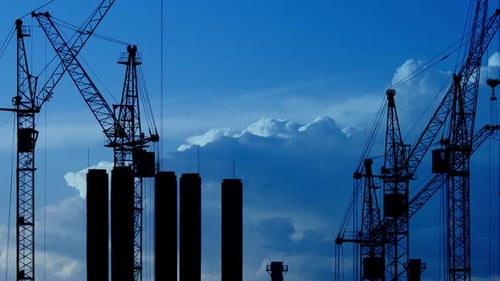 Construction Site at Dusk with Purple Sky
