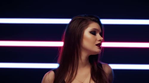 European Woman Singer Sings a Song in the Studio for a Music Video