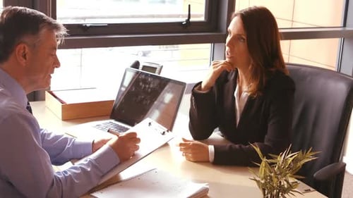Business Meeting in Modern Office Between Man and Woman