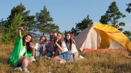 A Counselor at a Summer Camp Having Fun with a Group of Children