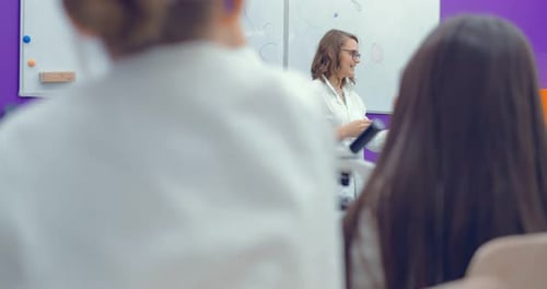 Enthusiastic Teacher Leads Science Class with Students