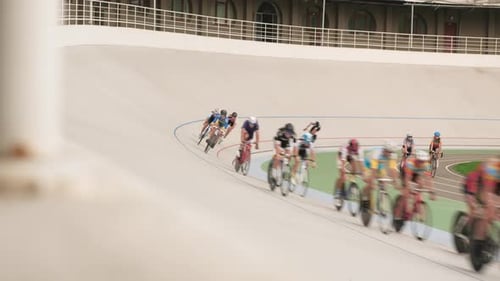 Pursuit bicycle race on cycling track. Track cycling team training on velodrome
