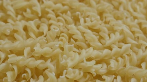 Raw traditional Italian food background close-up 4K 2160p 30fps UltraHD tilting footage - Corkscrew