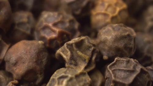 Close Up of Wrinkled Black Peppercorns