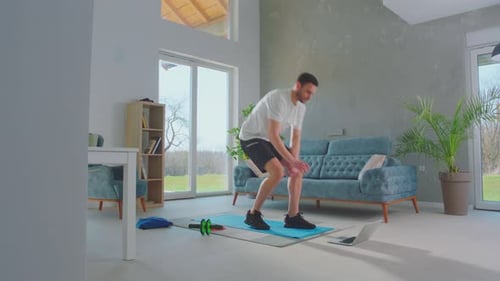 Man Doing Lunges at Home Workout
