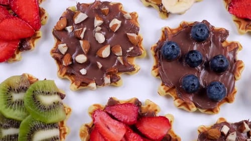 Close Up of Waffles with Chocolate and Fruit