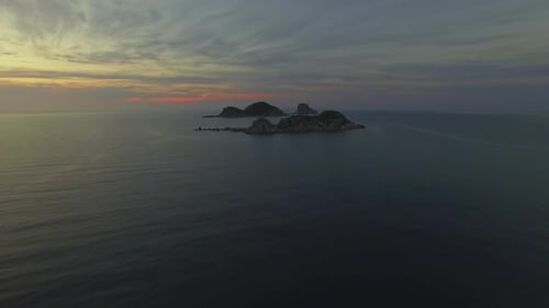 View From a Drone To a Beautiful Island in the Triozerie Bay at Sunrise