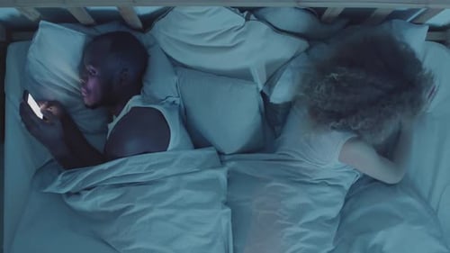 Boyfriend Hiding Phone from Sleeping Girlfriend