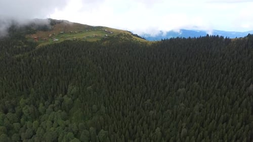 Little Plateau Houses In The Meadow Above Top Of The Mountain