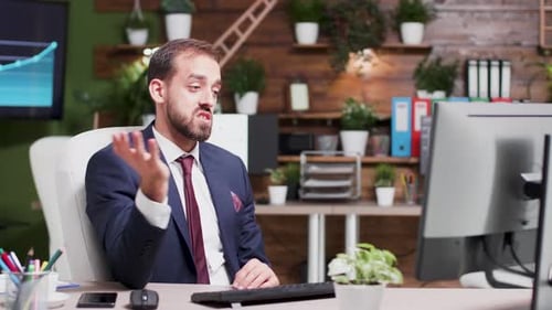 Man Explains During Online Business Video Call