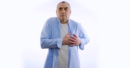 Elderly Man Having Pain in Chest, White Background