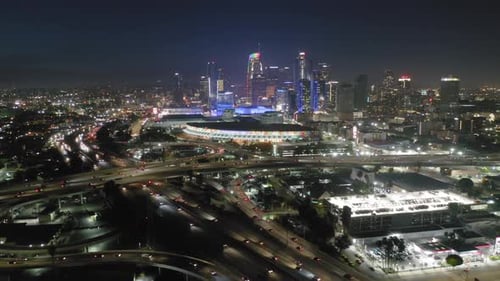 Amazing Aerial View of the Cityscape at Night. Brightly Illuminated City Life of Los Angeles