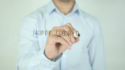 Feliz Día del Trabajo, escrito en pantalla
