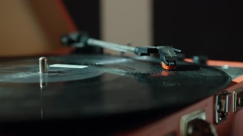 Vintage Record Spinning on Red Record Player
