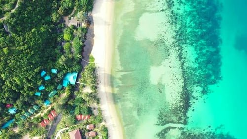 Aerial drone sky of tropical coast beach vacation by blue water with white sandy background of a day