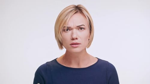 Woman Expressing Confusion and Frustration Close Up