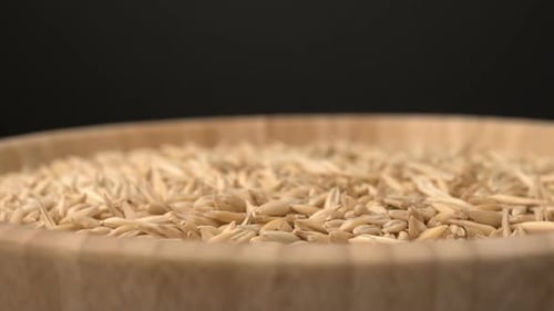 Wooden Bowl Filled with Natural Grains