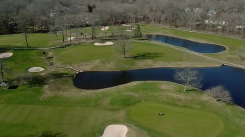 Aerial View Establishing Shot of American Neighborhood, Suburb. Real Estate, Golf Course, Around
