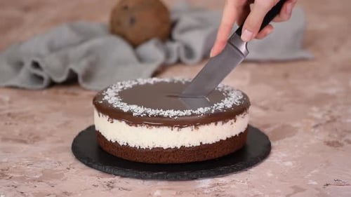 Coconut Cake Gets Chocolate Frosting Treatment