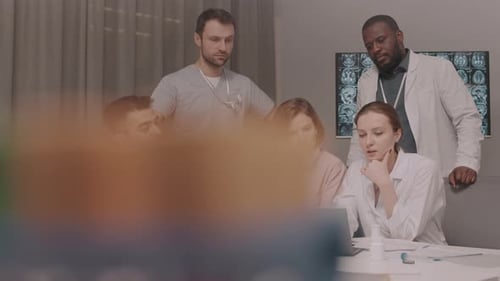 Doctors Having a Meeting Looking at Brain Scan