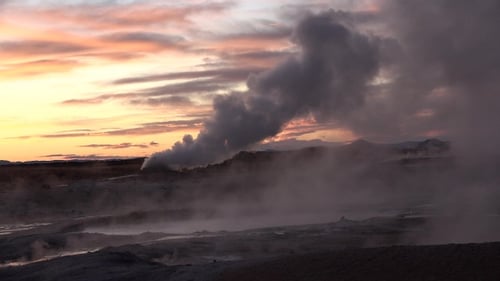 Iceland. Geothermal region area valley with smoking fumaroles and hot streaming water from geysers.