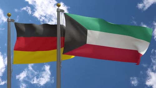 Flags of Germany and Kuwait Waving on Flagpoles
