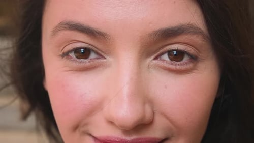 Close Up of Smiling Woman Girl Opening Her Beautiful Brown Eyes