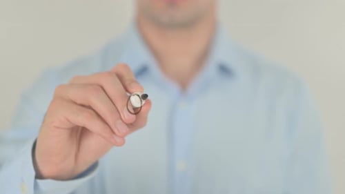 Hand Writes Out of Stock Message on Glass