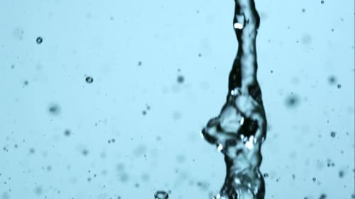 Bubbles Rising Through Clear Blue Water Stream