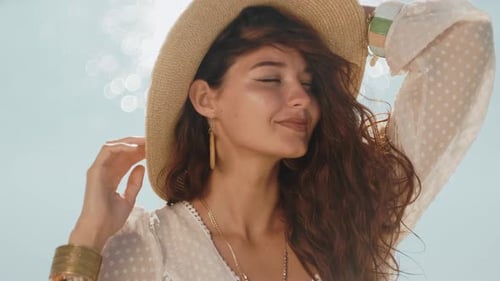 Woman Resting on the Beach During Vacation