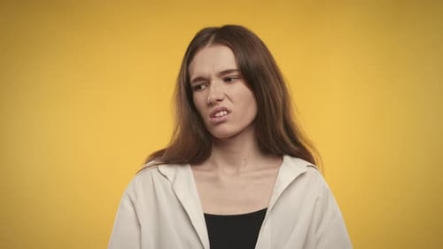 Woman with Brown Hair Contemplating Next Move