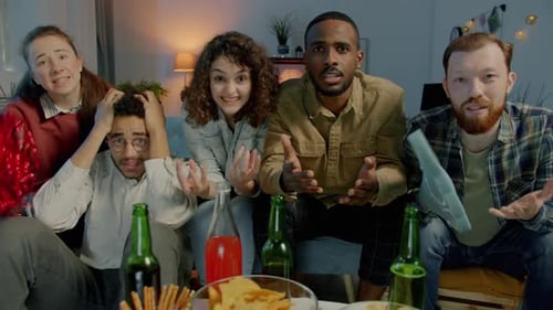 Portrait of Excited Sports Fans Watching Competition Cheering Then Feeling Disappointed at Home