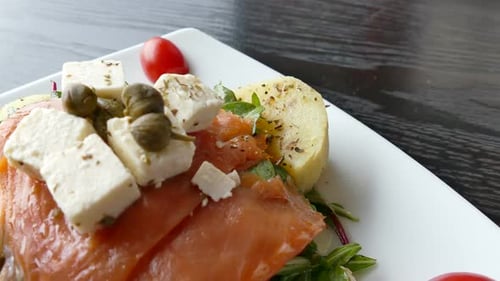 Vibrant Salmon and Cheese Salad on Plate