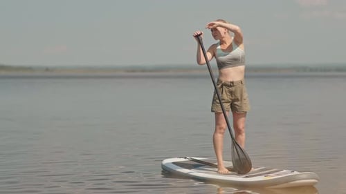 Woman Stand Up Sup Surfing in Lake