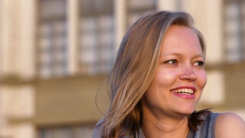 Smiling Woman Portrait Close Up in Golden Hour