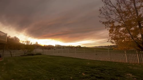 Time Lapse of Fiery Autumn Sunset Over Suburbia