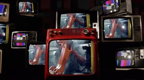 Vintage Televisions Showing Robot Arm and Static