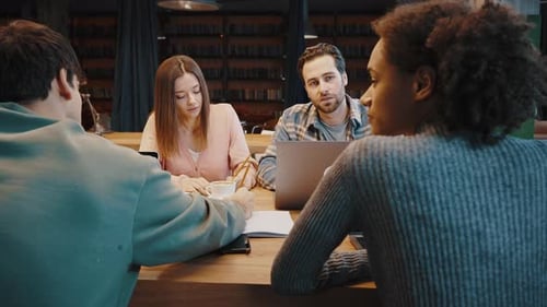 Diverse Multicultural Young People Students Engaged in Learning at Library