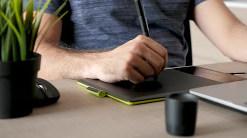 Working with Digital Tablet at Home Office