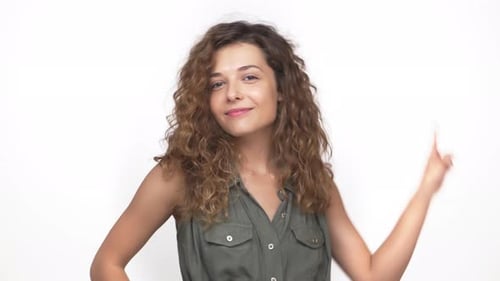 Smiling Woman with Curly Hair Poses on White