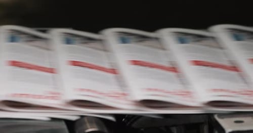 Newspapers, Tabloids, Print Plant Factory,magazine Transports on Conveyor Belt Line After Printing