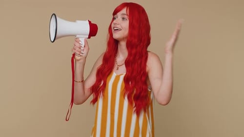 Young Woman Speaking into Megaphone