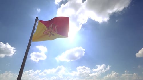 Flag of Sicily Waving Against Blue Sky and Sun