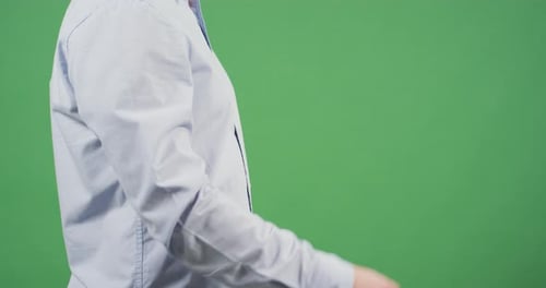 Side view of a man gesturing money