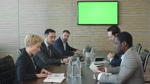 Business Meeting at a Conference Table