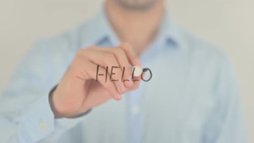 Man Writes Hello with Marker