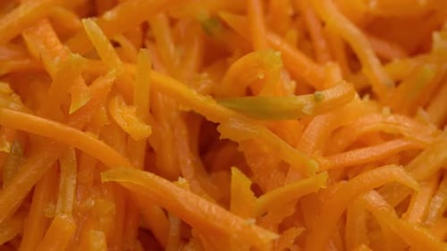 Close Up of Freshly Shredded Orange Carrots