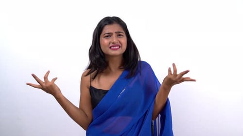 Frustrated Woman Gesturing in Confusion on White Background