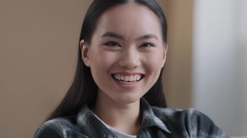 Smiling Woman Laughing in a Close-up Portrait