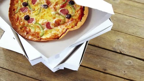 Delicious pizza in pizza box